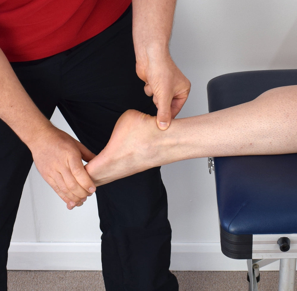 An image of a man's tendons/ankles.